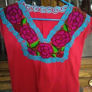 Embroidered blouse.